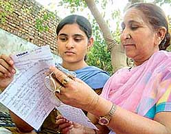 Dalbir Kaur, sister, and Sawandeep, daughter of Sarabjit Singh, read his letter in Bhikhiwind.