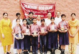 Winners of the essay writing contest, organised to mark Earth Day, with the Principal and other staff members of Maharishi Dayanand Public School, Daria, on Saturday.