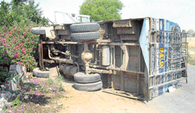 The overturned bus near Mehtab Palace at Ahmedgarh, the passengers of which were rescued by public on Saturday.