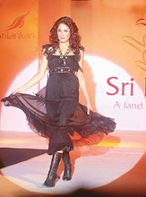 A model showcases a dress during the Sri Lankan evening in New Delhi on Saturday night.