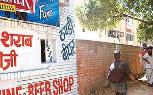 The allottee of a liquor vend in Sector 20 rehri market has opened a window facing the main road separating Sectors 20 and 21 in Chandigarh.