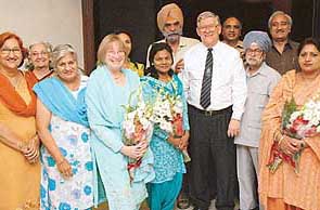 Faculty members and old students from Forman Christian College, Lahore, share their joy with the Indian counterparts on arrival at Chandigarh.