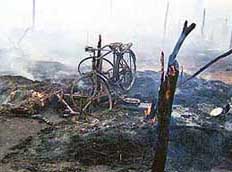 Remnants of jhuggis of migrant labourers destroyed in a fire at Sarabha village on Sunday.
