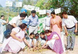 Students of Sukhdev Thapar School plant saplings on the occasion of World Earth Day.