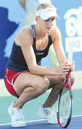 Nicole Vaidisova of the Czech Republic takes a breather as she plays against Suchanun Viratprasert of Thailand during the Fed Cup in Bangkok on Sunday. Vaidisova won 3-6, 6-2, 6-0.