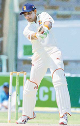 Mohammad Azharuddin plays a shot during the first one day between Pakistan and India senior cricket teams in Karachi on Sunday.