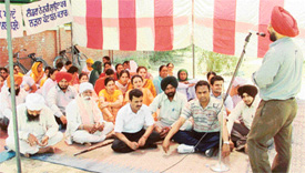 Staff of Nankana Sahib Public School on strike against the appointment of Mr Maheshinder Singh Grewal as Additional Secretary of the Nankana Sahib Education Trust