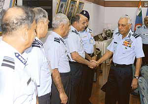 Air Chief Marshal S.P. Tyagi greets IAF commanders during the IAF commanders conference at the Air Force headquarters in New Delhi on Monday.