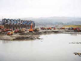 A view of Madhopur headwork from which silt in being removed to increase water storing capacity of the reservoir.