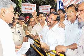 Members of the Association of Small-Scale Industrialists submit a memorandum to Deputy Commissioner R.K. Rao in Sector 17, Chandigarh, on Tuesday