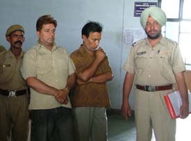 The accused, Kishore Kumar and Jagmohan Lal, being presented at the District Courts in Ludhiana on Tuesday