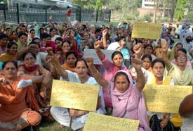 Teachers stage a dharna in front of the Deputy Commissioners office in Ludhiana on Tuesday
