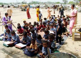 A school being run in an open ground 