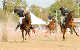 Riders display their tent-pegging skills at the Chandigarh Horse Show on Wednesday