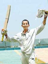 Skipper Gurinder Singh of the Chandigah cricket team in a jubilant mood after scoring a double century in a semifinal match against Ropar during the Inter-District Cricket Tournament for the Sushil Bali Trophy at the PCA Cricket Stadium, Mohali, on Wednesday