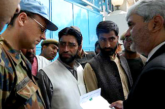 Members of the Jammu and Kashmir Democratic Political Movement submit a memorandum to the United Nations after holding a demonstration against the state government for giving Gulmarg and Pahalgam on lease to private companies and also harassment and killing by security forces in Kashmir, in Srinagar on Wednesday