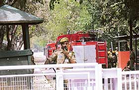 Fire fighters in the compound of the Prime Ministers residence in New Delhi after a minor fire was reported on Wednesday.