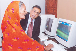 Worldwide Head (Community Affairs) Microsoft Corporation Akhtar Badshah with a beneficiary at a press briefing in New Delhi