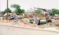 Reconstruction in progress at the SBS Nagar slum in Ludhiana on Thursday