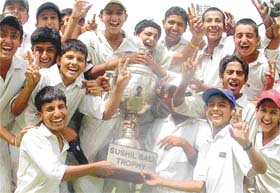 Team members of Chandigarh in a jubilant mood after winning Sushil Bali Trophy at the PCA, Mohali