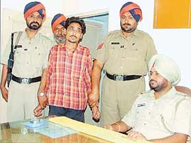 Kewal Singh, a narcotic smuggler, with the Salem Tabri police in Ludhiana