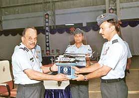 The Air Officer Commanding-in-Chief, Maintenance Command, Air Marshal K.S. Chaturvedi (left), releases the 500th helicopter to the Commanding Officer of 127 Helicopter Unit, Wg Cdr K. Allen, at 3 BRD in Chandigarh on Monday.