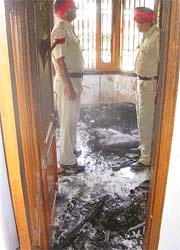 A view of the puja room after a fire broke out at a house in Sector 70, Mohali, on Monday.