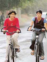 As the morning drizzle washed away the summer heat, city residents took to the streets to enjoy weather
