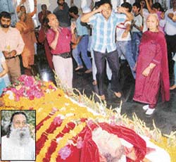 Osho sanyasis sing and dance to bid farewell to Swami Narain Satyarthi (inset) at Oshodhara, Panchkula