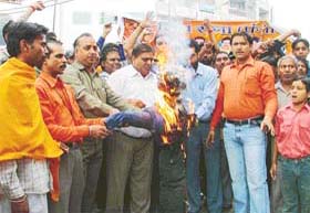 Activists of the Shiv Sena burn an effigy of terrorism in Ludhiana