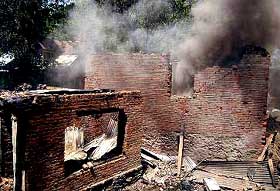 Houses damaged during a gunfight between militants and the Army at Kangan, Srinagar, on Wednesday