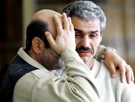 Relatives of passengers of a crashed Armavia Airus A-320 passenger airliner react at the airport in Sochi on Wednesday