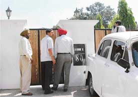 CBI sleuths outside the residence allegedly belonging to former Haryana Chief Minister Om Prakash Chautala at Sector 9, Chandigarh, on Thursday