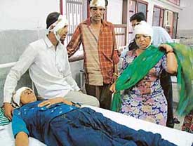 Four members of two families, who were injured by a gang of armed robbers in Kharag Mangoli in Old Panchkula, under treatment at General Hospital, Sector 6, Panchkula, on Thursday