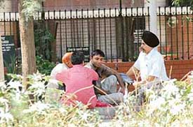 Agents outside the RBI regional office try to strike a deal with customers for exchanging soiled notes