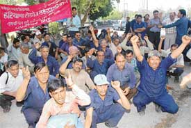 Members of the Haryana Roadways Workers Union protest against the anti-worker policies of the Haryana Government in Chandigarh on Thursday