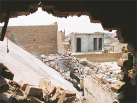Extensive damage was caused to neighbouring houses when a powerful explosion occurred in a cracker manufacturing unit in Peeru Banda Colony in Ludhiana on  Friday
