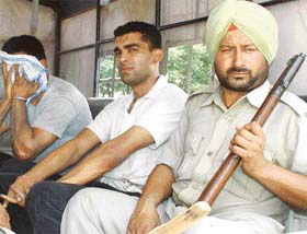 The two persons arrested at Devi Dass Pura village, near Jandiala Guru, after a firing incident over a land dispute