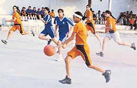 A match in progress during the Junior State Basketball Championship for boys and girls at New Public School, Sector 18, Chandigarh