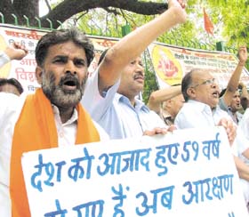 Members of Bhartiya Aggarwal Parishad protest against the proposed OBC quota in central universities at Jantar Mantar in the Capital
