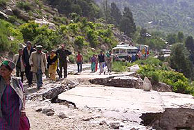 A view of a portion of the Hindustan-Tibet road which caved in near Ribba village in Pooh subdivision on Sunday