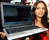 A model displays a new range of notebooks launched by Toshiba in association with HCL Infosystems in Bangalore on Tuesday.  PTI
