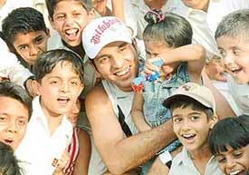 Yuvraj Singh with budding cricket players at DAV School, Sector 8, Chandigarh