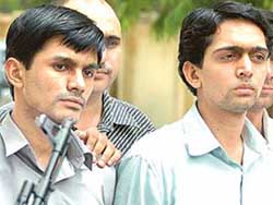 Militants Mohammad Ali (left) and Abdullah are presented to the media by the speical staff of the Delhi Police in New Delhi on Tuesday. 