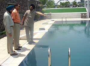 Mr Sandeep Hans, SDM, inspects the swimming pool of the PCA Club, Mohali, on Friday.