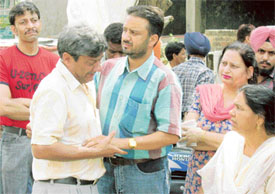 Grieving father of Rajesh, who is missing along with a woman employee in Ludhiana