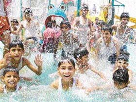 Students chill out at a water park in Bathinda