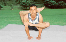 Yoga expert Munish demonstrates a difficult asana