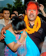 Nepals Maoist rebel leader Suresh Ale Magar (right) consoles his wife Mana Maya Ale Magar after leaving Nakhu Jail in Patan, Nepal, on Thursday.