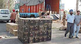 Cases of whisky which were seized by the Sales Tax Department officials at Zirakpur on Saturday.